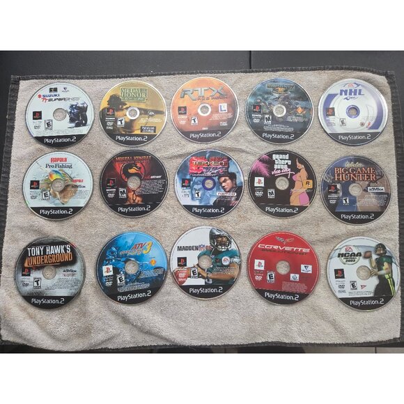 Disk lot of PlayStation 2 games 63 games - Picture 1 of 5